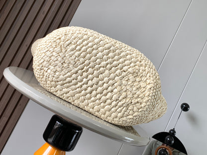 Medium anagram basket bag in iraca palm and calfskin