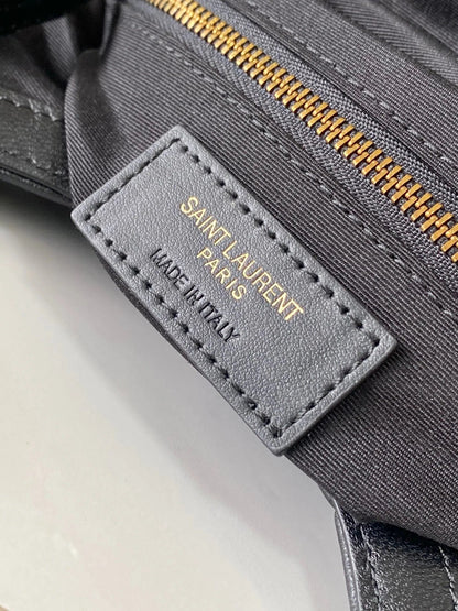 26 BLACK SHEEPSKIN WITH GOLD BUCKLE BAG