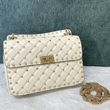 garavani rockstud spike medium 24cm white lambskin