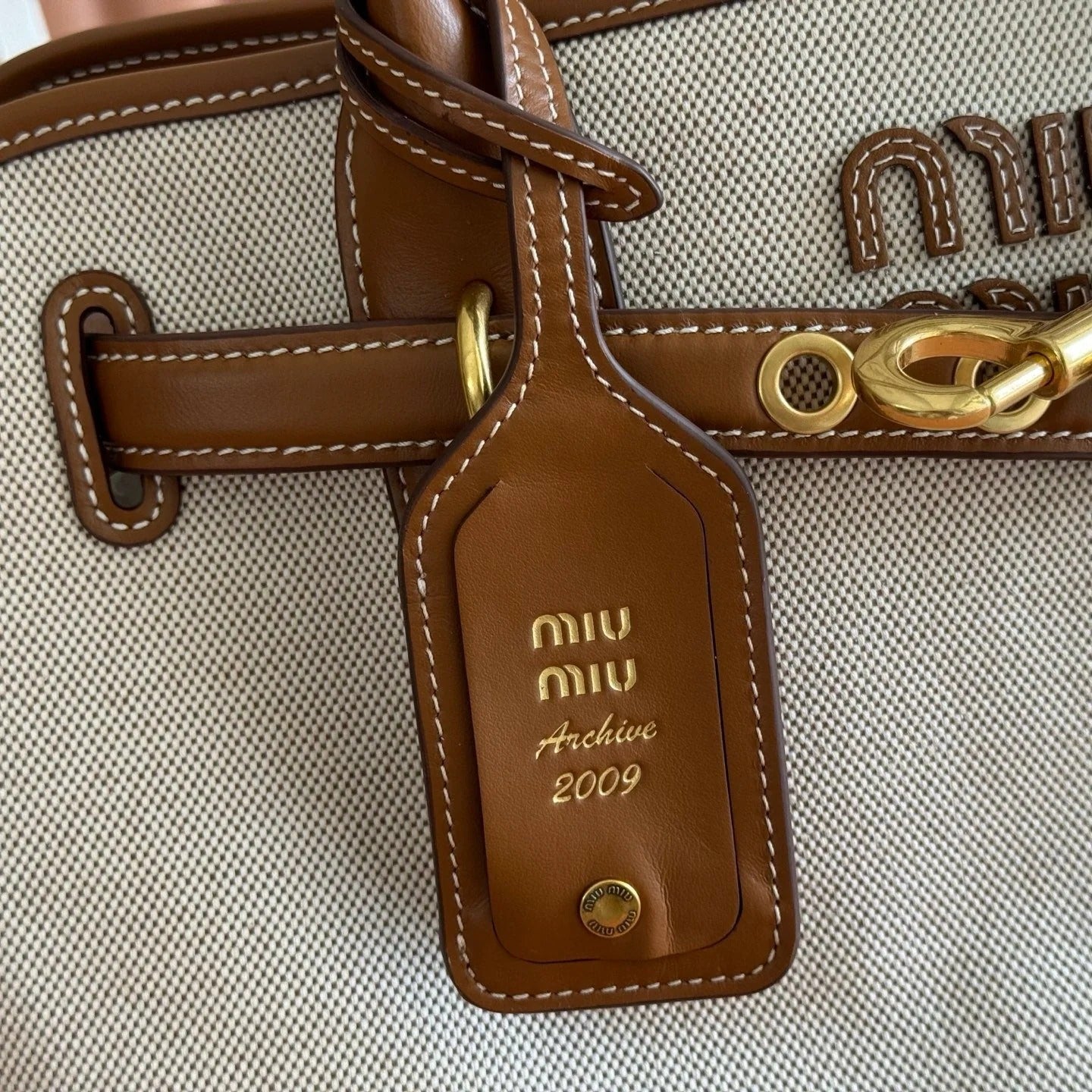 Miu Miu Aventure Handbag 44 Beige in Canvas 285306