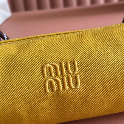 Miu Miu Adventure Nappa Canvas Bucket Bag 22 Yellow in Fabric 285323